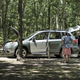 A woman waits as her car is searched near where President Barack Obama golfs at Farm Neck Golf Club on Aug. 12, 2015, in Oak Bluffs on Martha’s Vineyard, Mass.
BRENDAN SMIALOWSKI/AFP/Getty Images